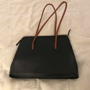 Celo and Patek leather handbag